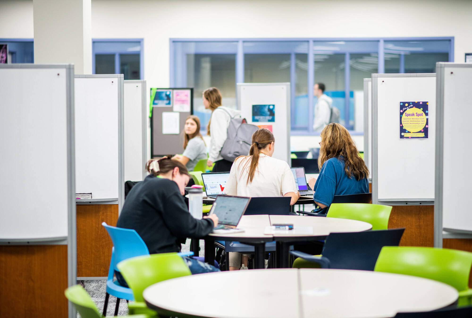 View of the Physics Help Corner and Engineering Success Center where tutors are assisting students.